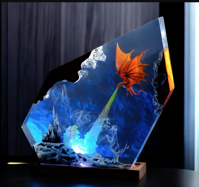 Dragon Resin Lamp — Orange Dragon Breathing a Blue Flame over a Castle, Faceted Epoxy on Wood Base - view 1