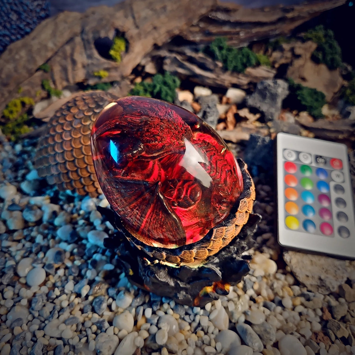 Crimson dragon egg lamp glowing red with remote