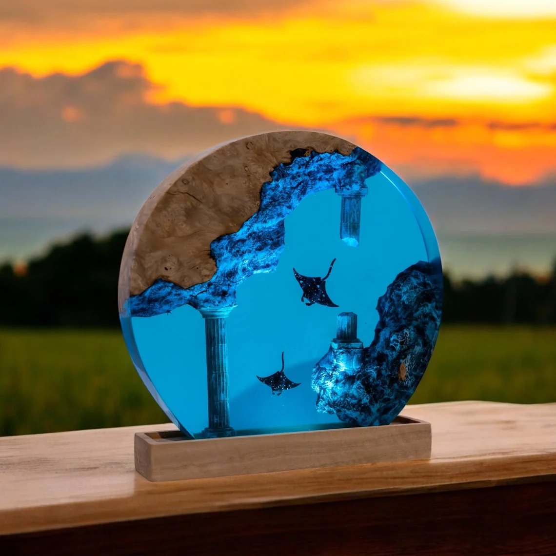 Round eagle ray resin lamp with sunken columns at sunset