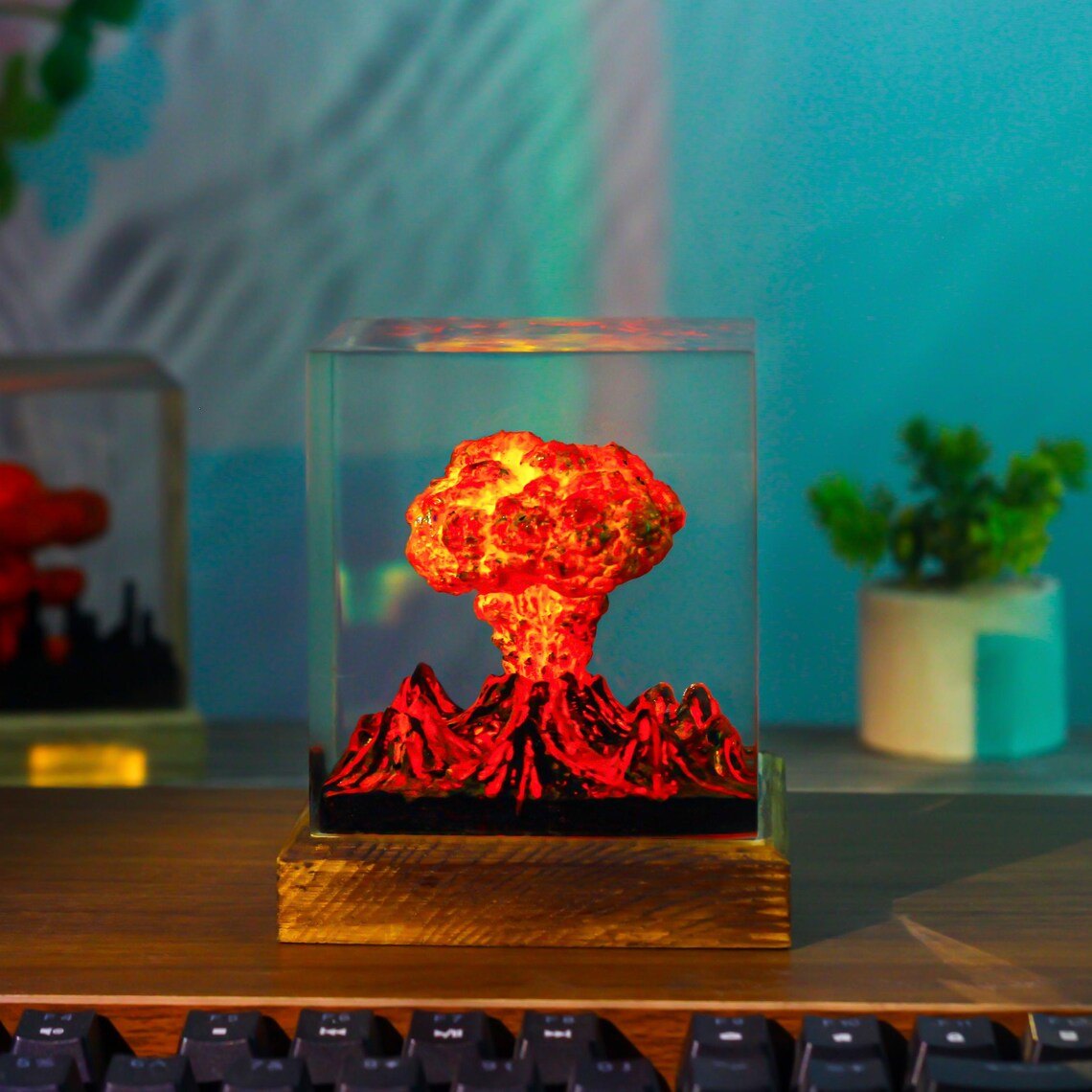 Volcano eruption epoxy lamp glowing on a desk