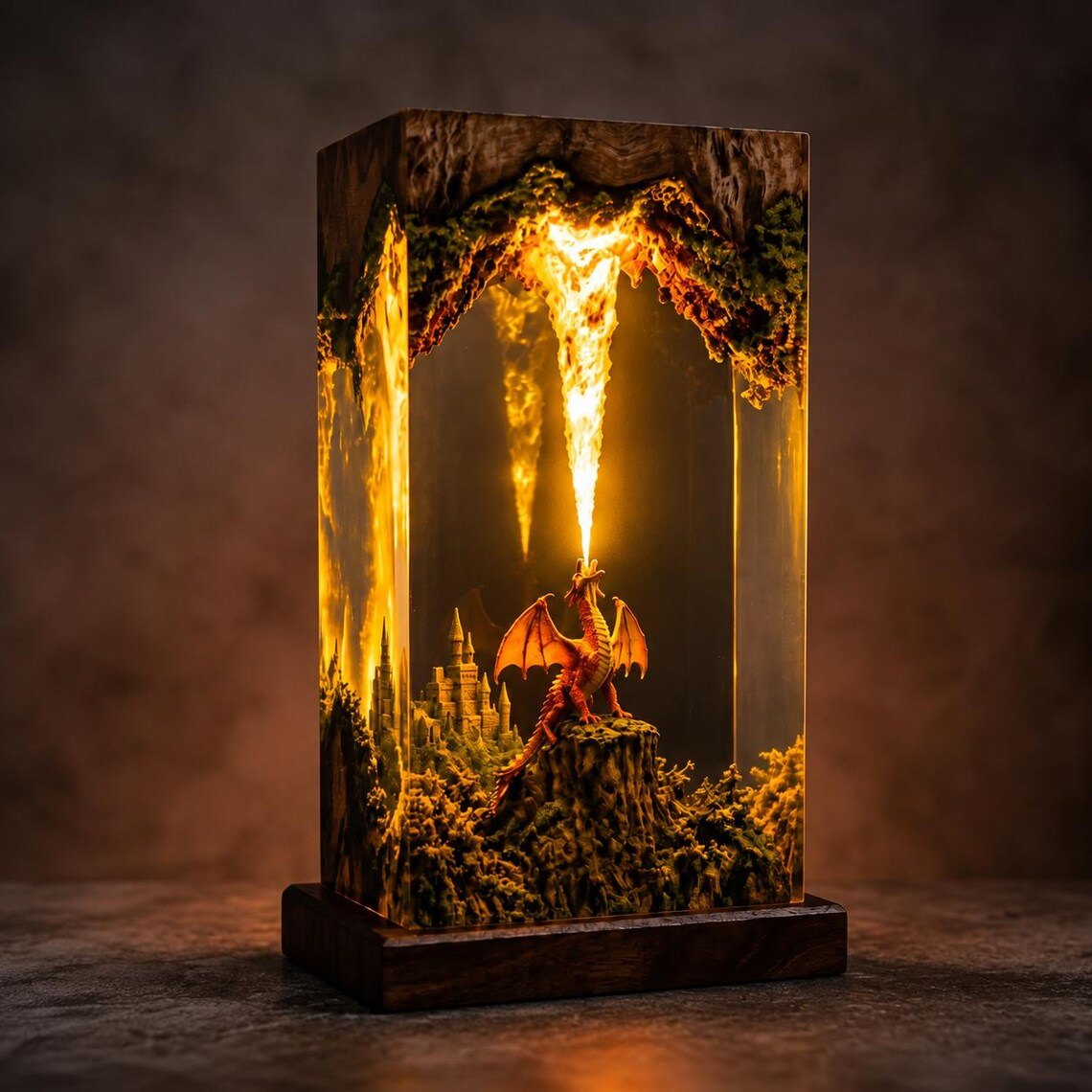Dragon resin lamp with a fire-breathing dragon glowing amber