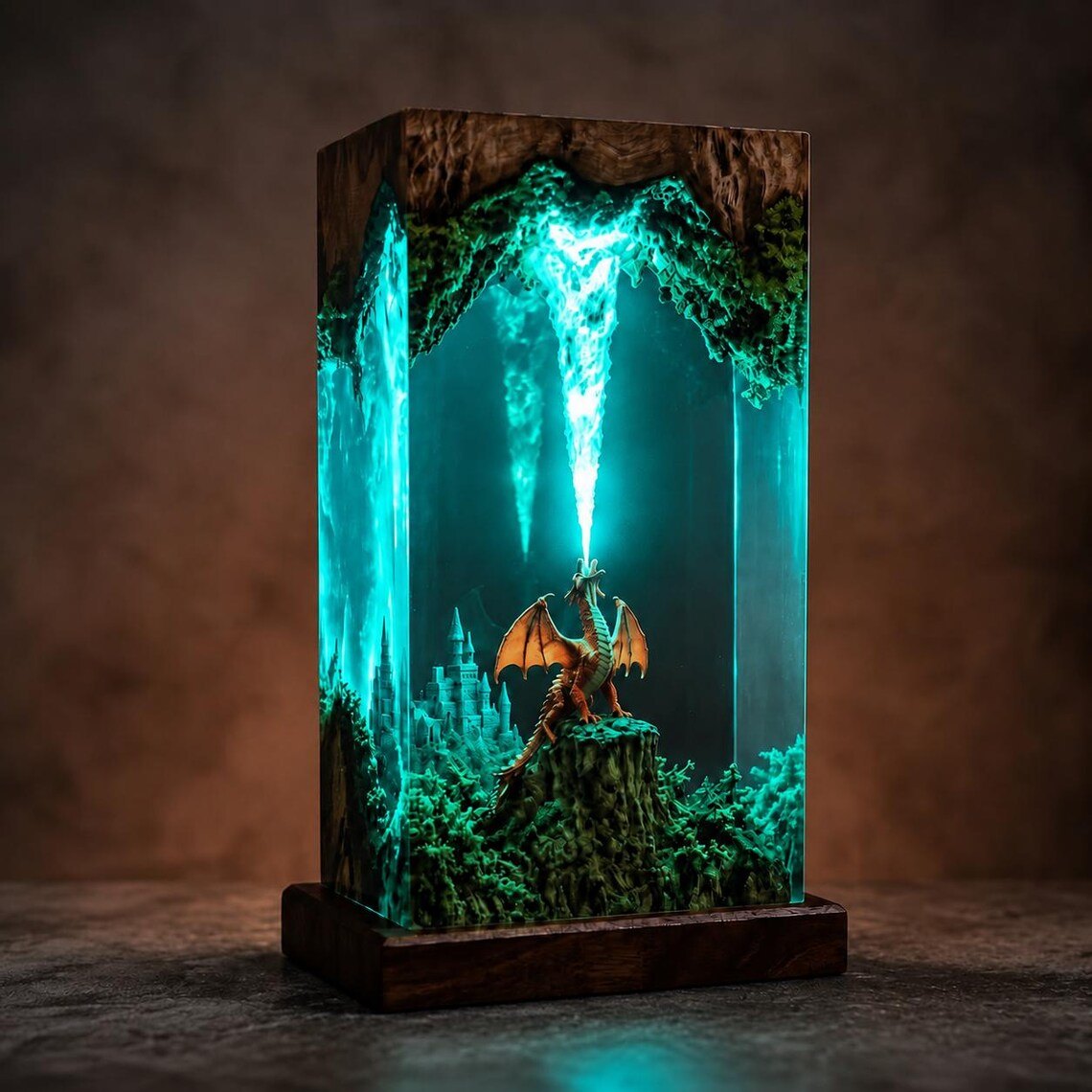 Fire-breathing dragon resin lamp glowing teal