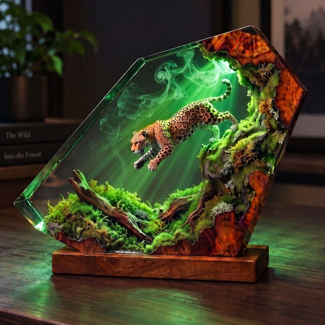 Jaguar resin lamp with burl wood frame lit in green