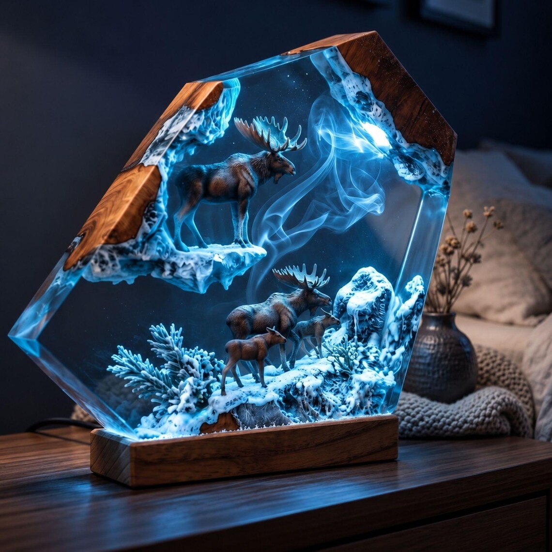 Moose winter resin lamp on a bedside dresser