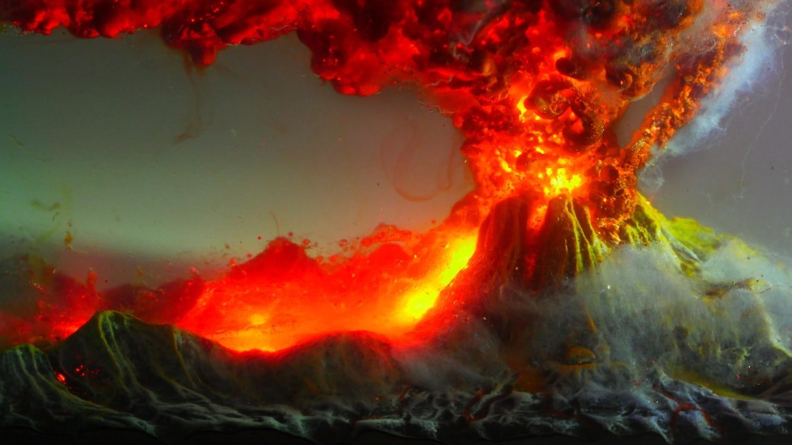 Volcano eruption cloud and glowing lava inside the block