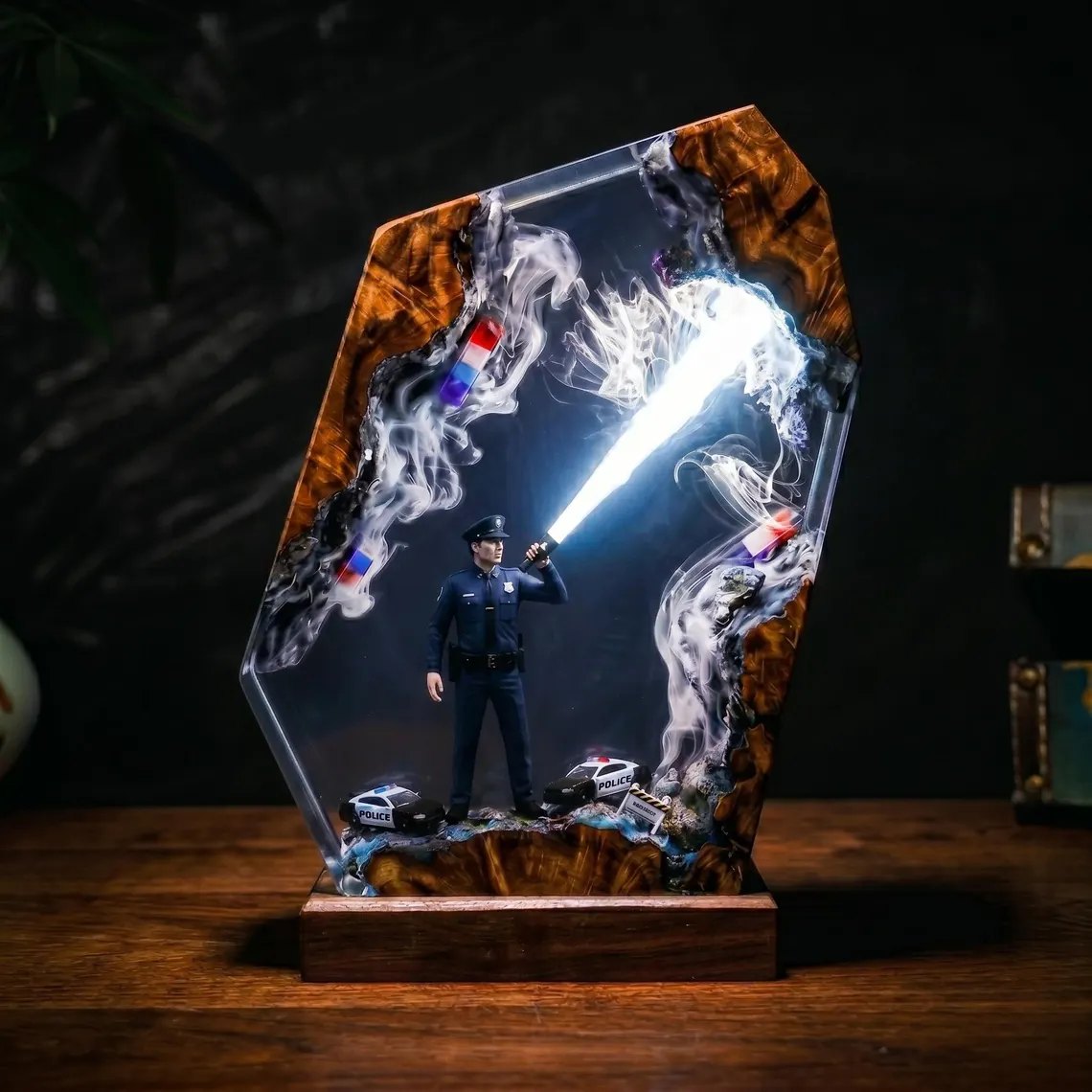 Police officer resin lamp with cool white flashlight beam