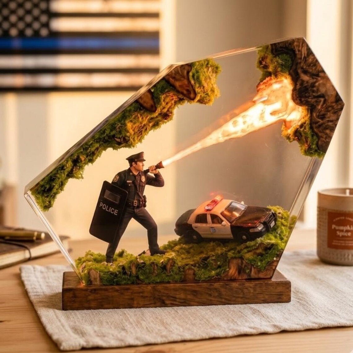 Police resin lamp with warm beam on a table