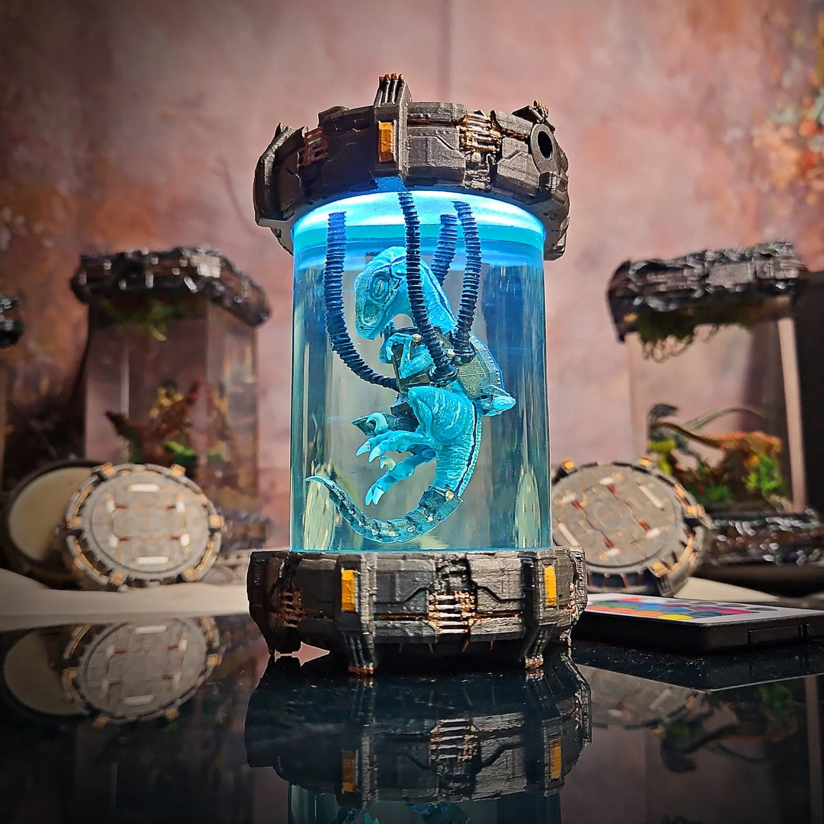 Raptor specimen capsule lamp glowing cyan on a sci-fi base