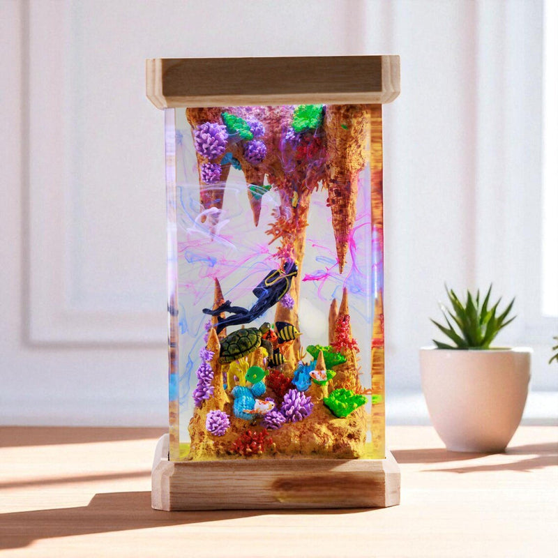 Scuba diver sea cave resin lamp with wood base by a plant