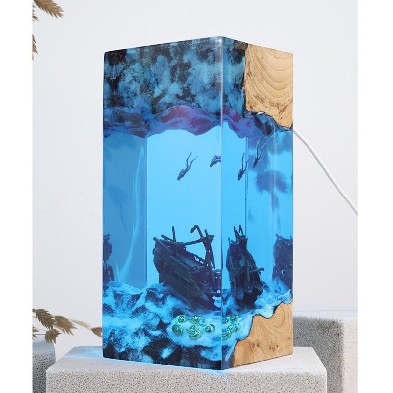 Tall shipwreck and divers resin lamp with wood corner