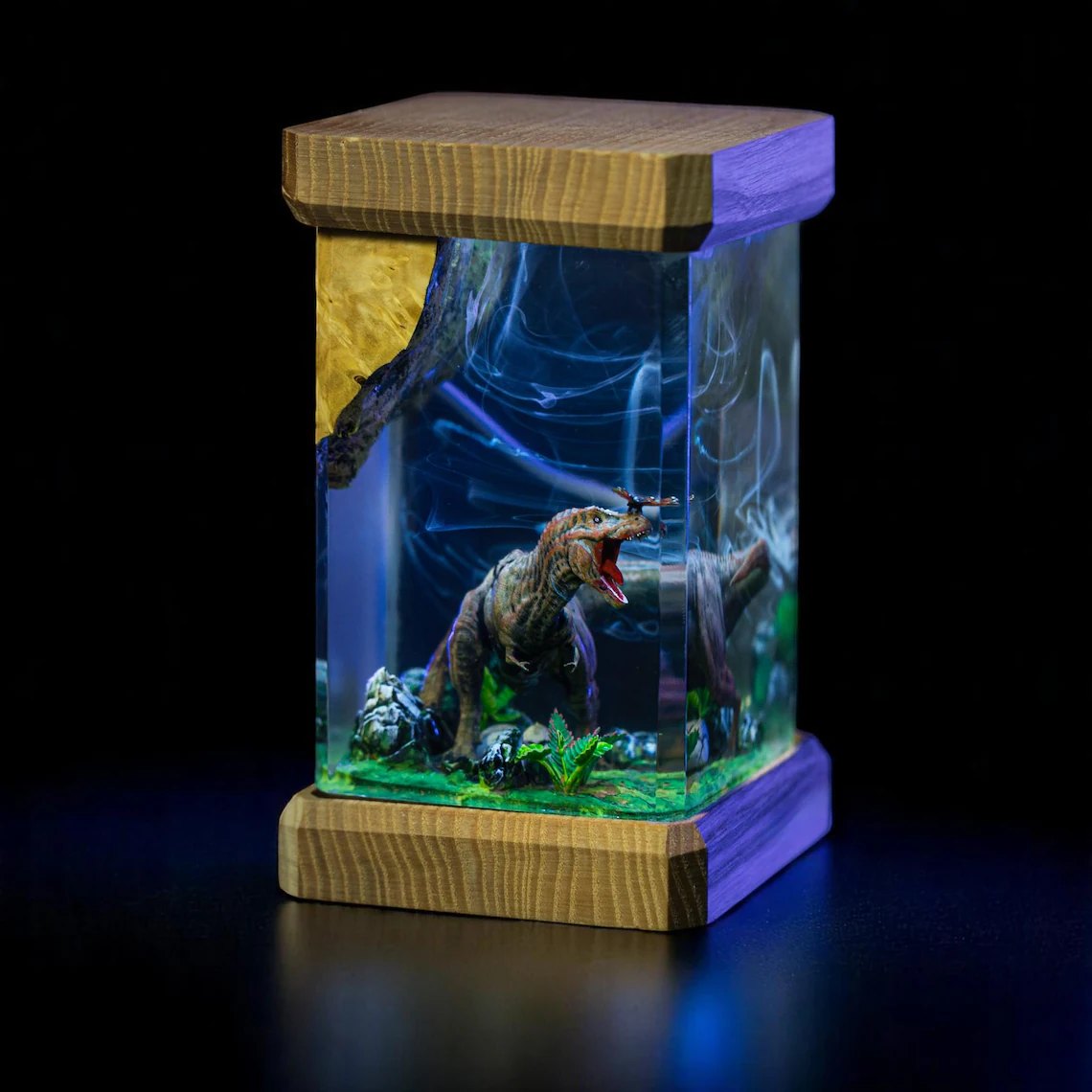 Side view of the T-Rex resin lamp with wood top and base