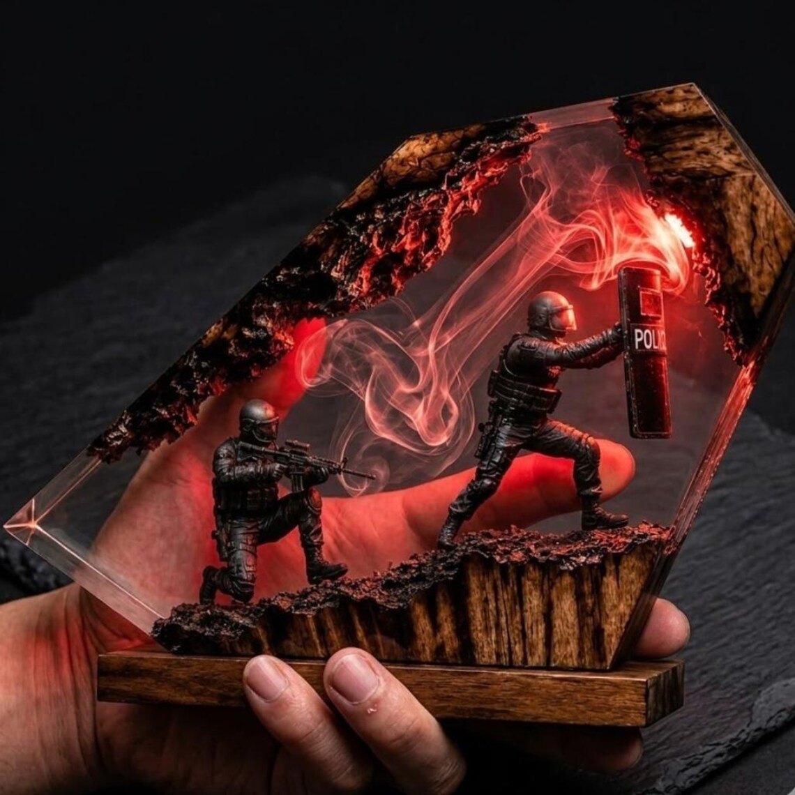 Police resin lamp held in hand, glowing red