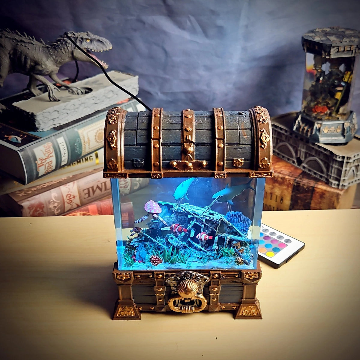 Treasure chest resin lamp on a desk with remote