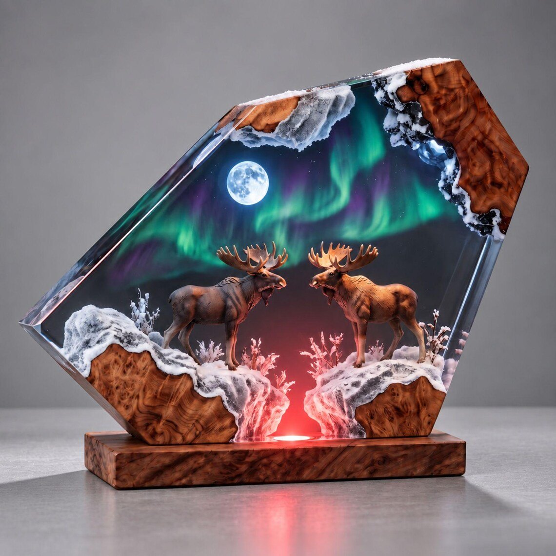Two moose aurora epoxy night light lit in red
